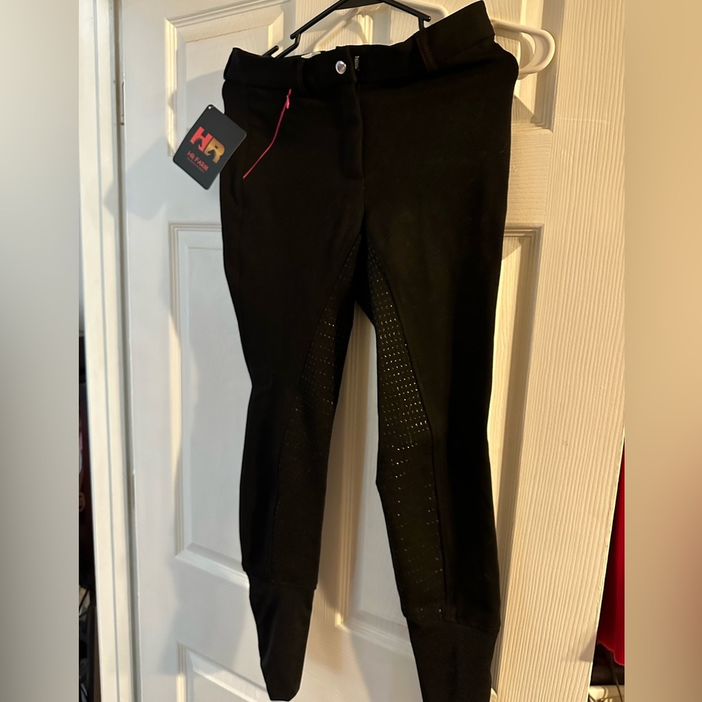 HR Farm riding pants. Black with hot pink piping on pockets. NWT Size 28.